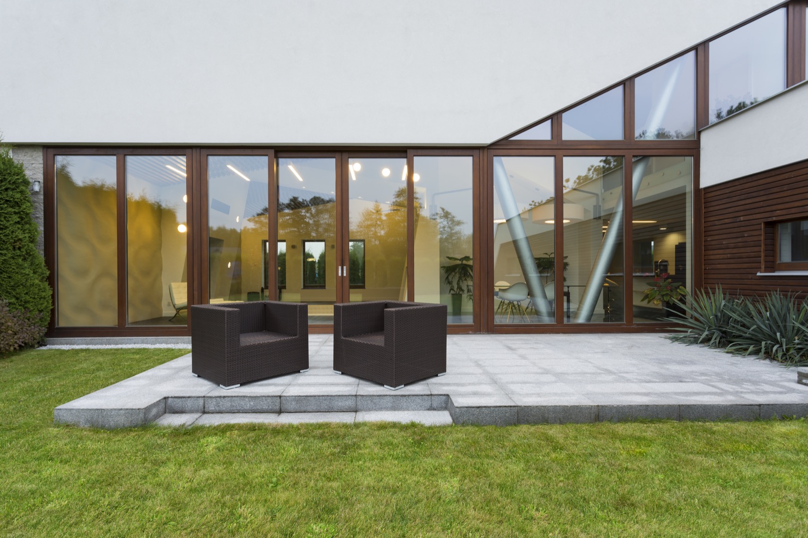 Villa patio with rattan chairs Omnia Reality
